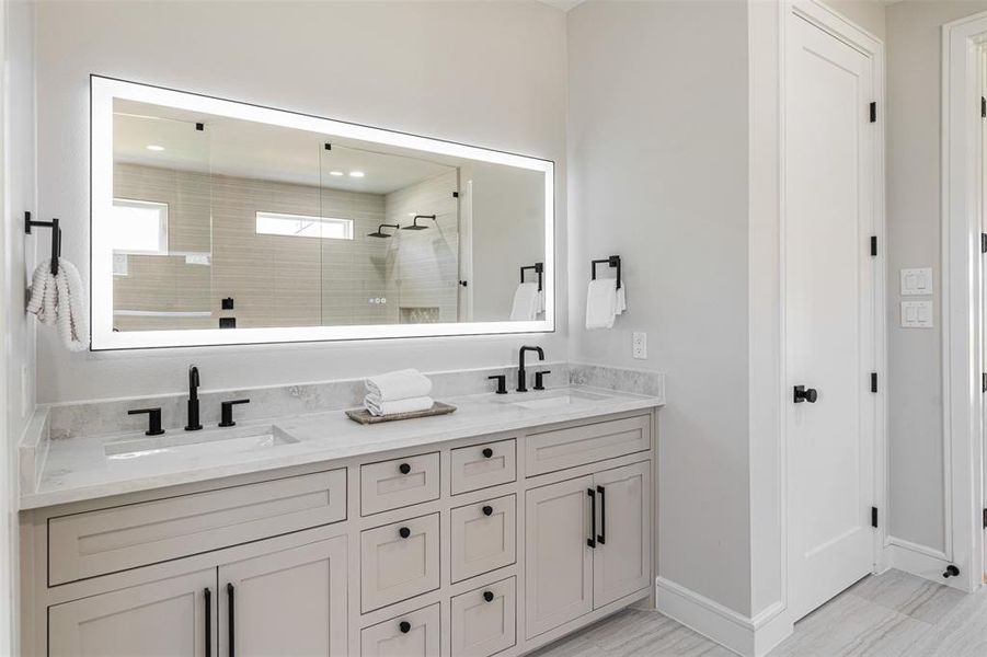 Double Sinks and linen closet Double Sinks and linen closet