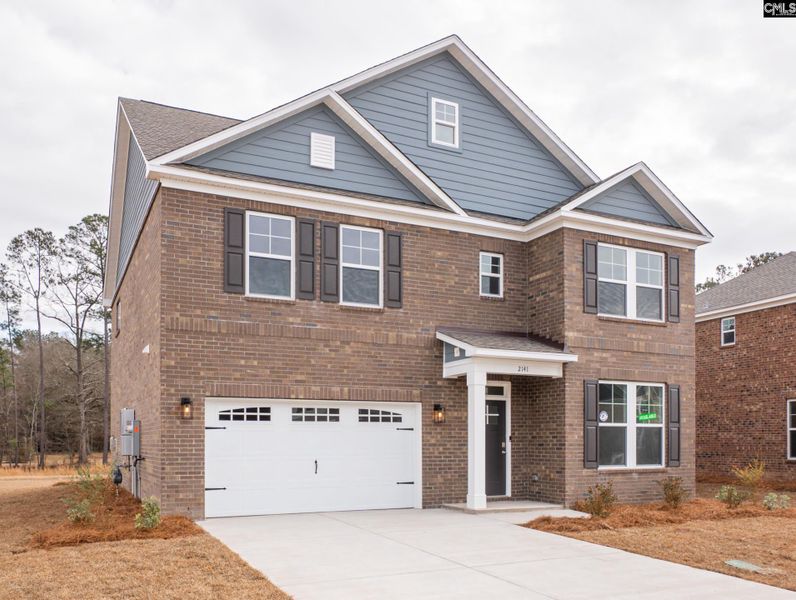 Front exterior of a new home in Beach Forest, Sumter, SC, highlighting curb appeal (Image 2). Front exterior of a new home in Beach Forest, Sumter, SC, highlighting curb appeal (Image 2).