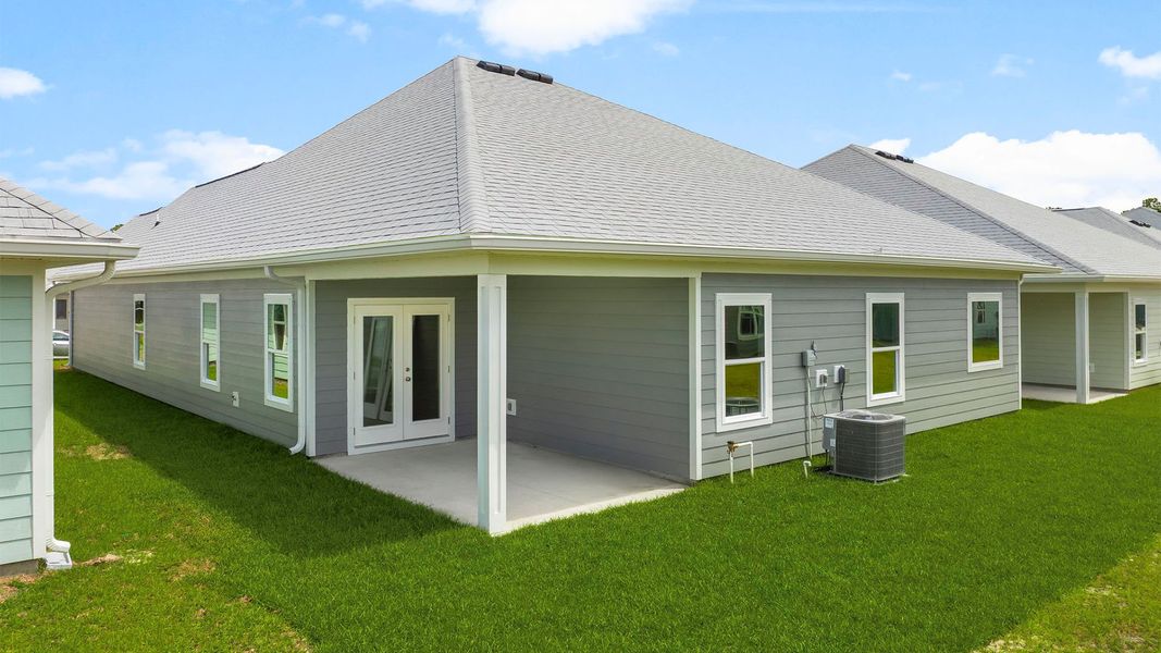 Exterior details and patio area of a home in WindMark Beach, Port Saint Joe (Image 3).