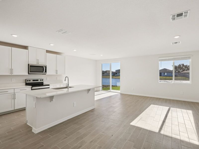 Furnished interior view inside a new home in Oakfield Trails - Classic Series, Parrish (Image 6).