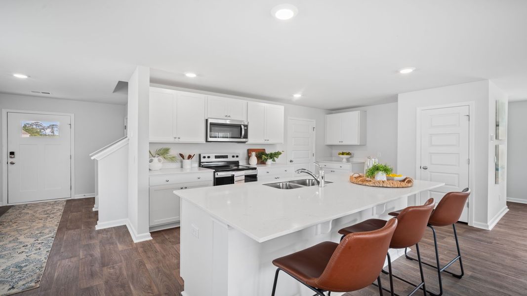 Representative furnished interior of a home built from the Elston by D.R. Horton in Longleaf Village, Rincon (Image 7).