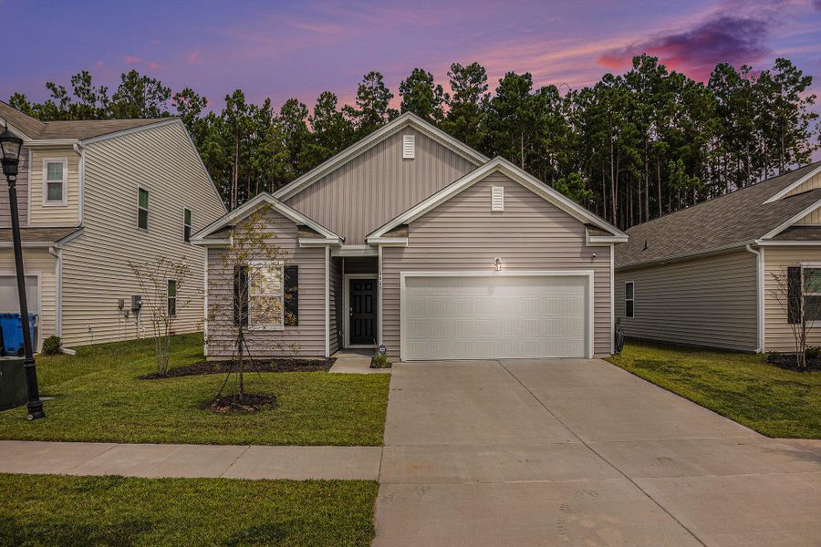 Front exterior of a new home in , Summerville, SC, highlighting curb appeal (Image 23).
