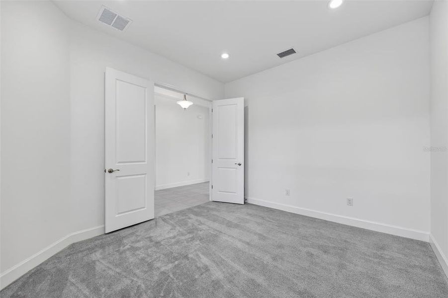 Spacious, unfurnished interior of a new home in Winding Ridge, Wesley Chapel (Image 30).