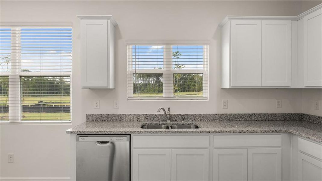 Furnished interior view inside a new home in Oakchase at Hampton, Hampton (Image 3).