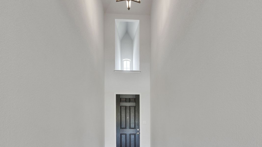 Furnished interior view inside a new home in Oaks at San Gabriel, Georgetown (Image 12).