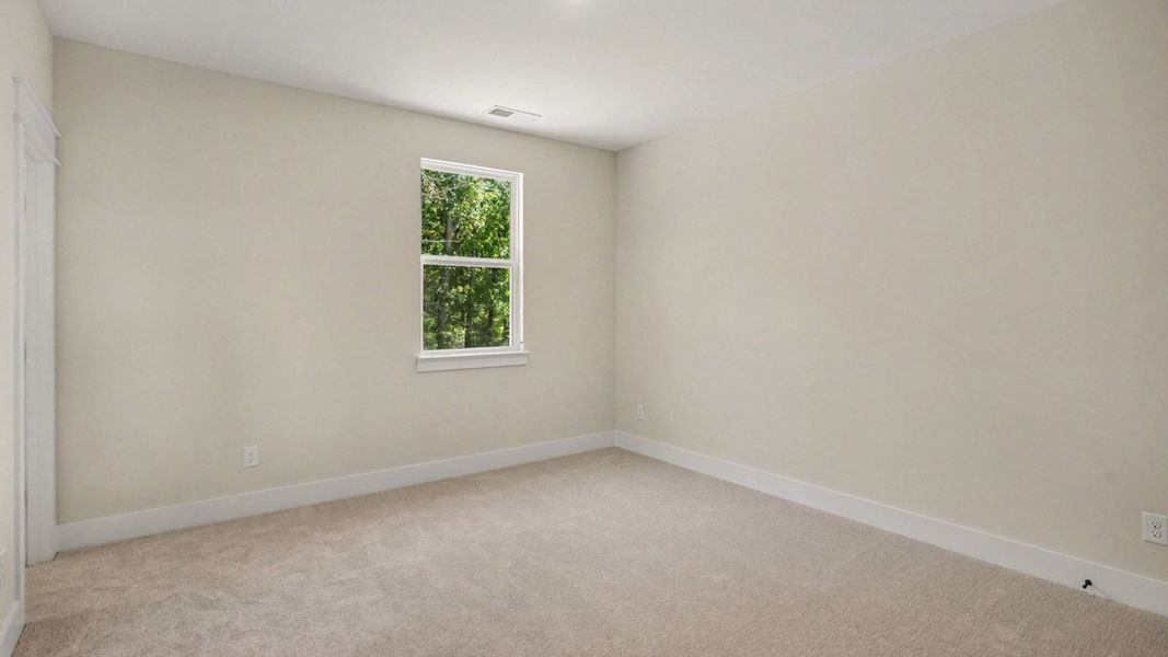 Secondary bedroom with window and closet Secondary bedroom with window and closet