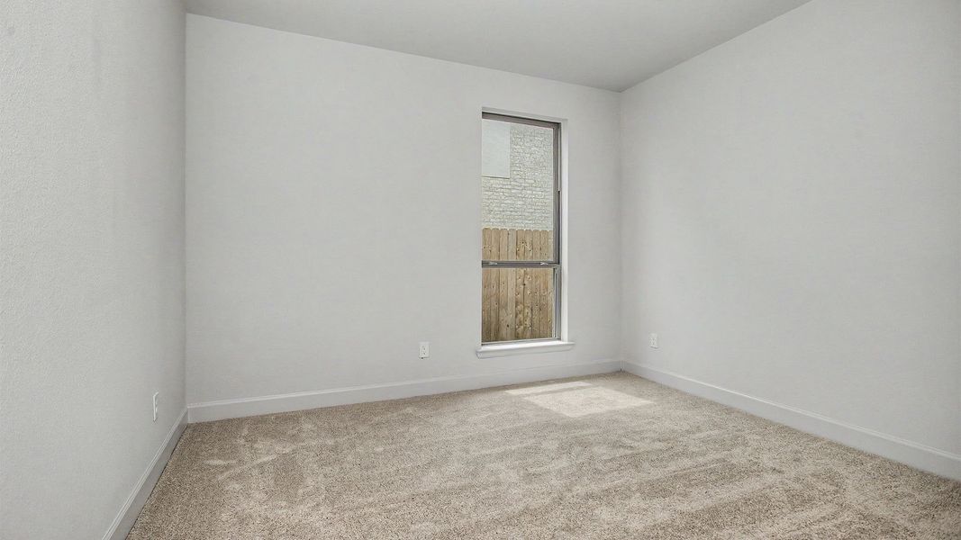 Spacious, unfurnished interior of a new home in Legacy Prairie at Katy Court, Katy (Image 11).