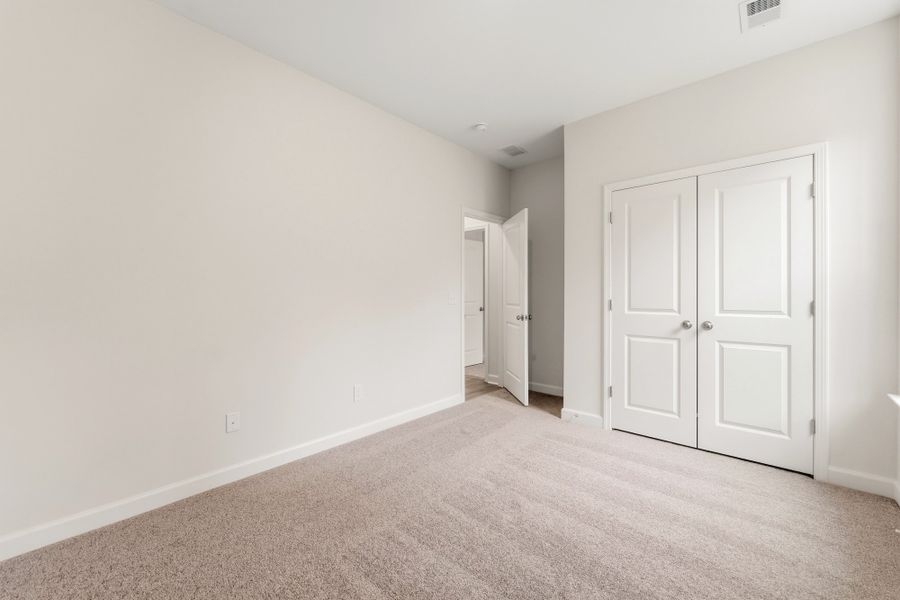Spacious, unfurnished interior of a new home in Landing at Pine Lake, Anderson (Image 34).