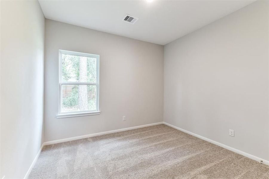 Spacious, unfurnished interior of a new home in Caney Creek Place, Conroe (Image 48).