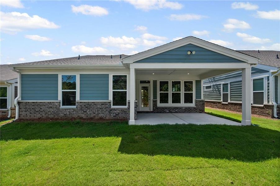 Front exterior of a new home in Laurel Farms, Dallas, GA, highlighting curb appeal (Image 21).