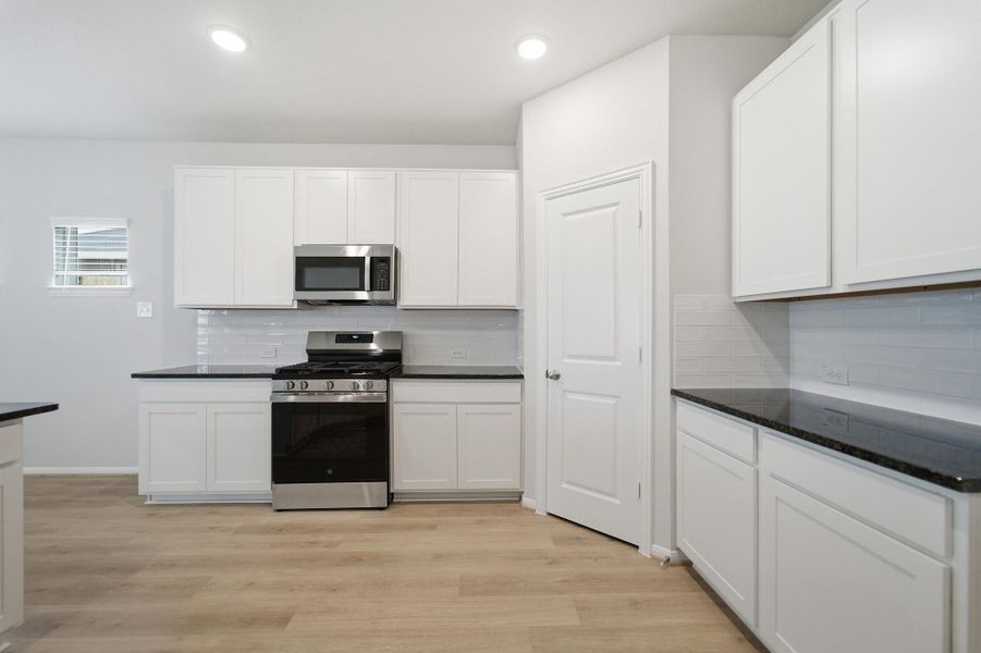 Furnished interior view inside a new home in Trails at Woodhaven Lakes, La Marque (Image 12).