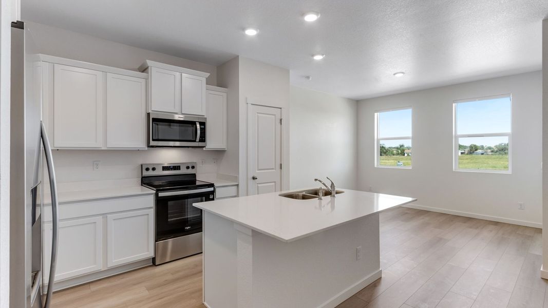 Furnished interior view inside a new home in Vista Meadows, Fort Lupton (Image 10).