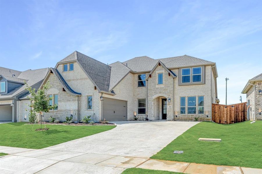 Front exterior of a new home in Mockingbird Hills, Joshua, TX, highlighting curb appeal (Image 2). Front exterior of a new home in Mockingbird Hills, Joshua, TX, highlighting curb appeal (Image 2).
