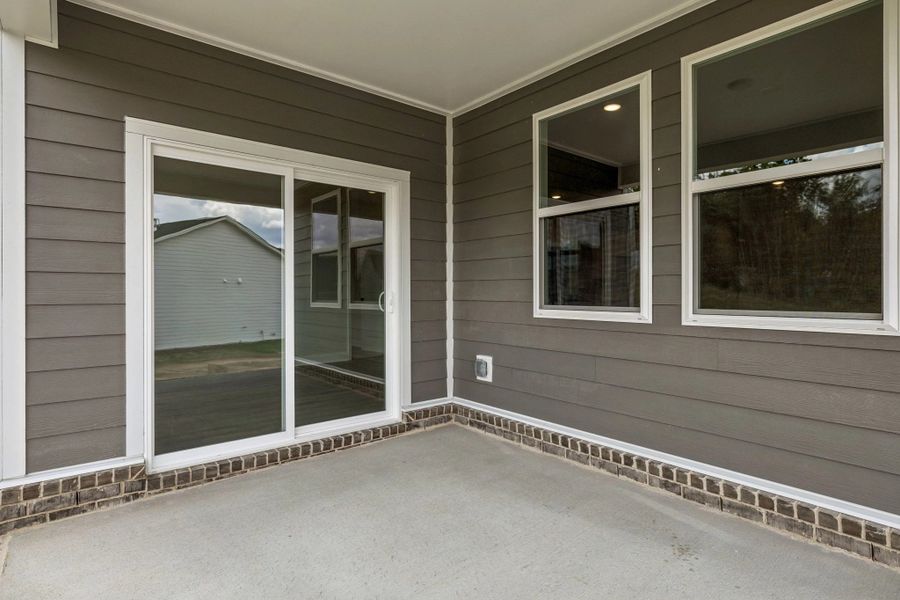 Exterior details and patio area of a home in Cedars at Cane Ridge | 55+ Community, Antioch (Image 4).