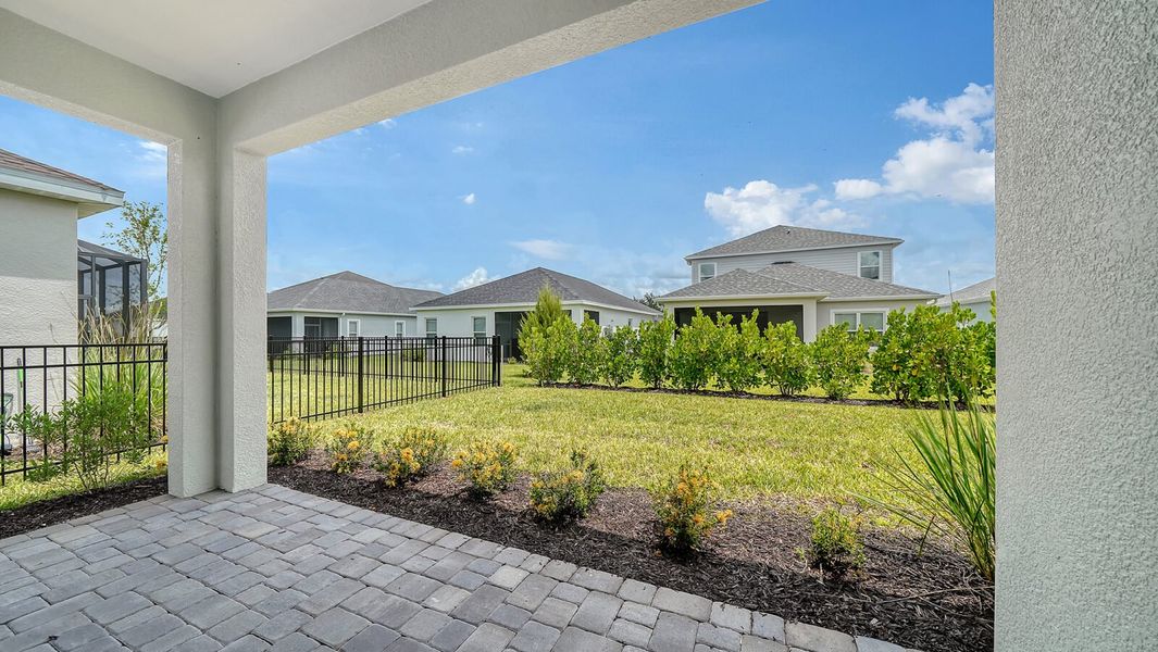 Exterior details and patio area of a home in Wildleaf at North River Ranch, Parrish (Image 3).