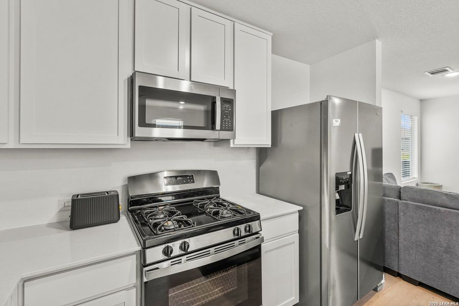 Furnished interior view inside a new home in Brookmill, San Antonio (Image 8).