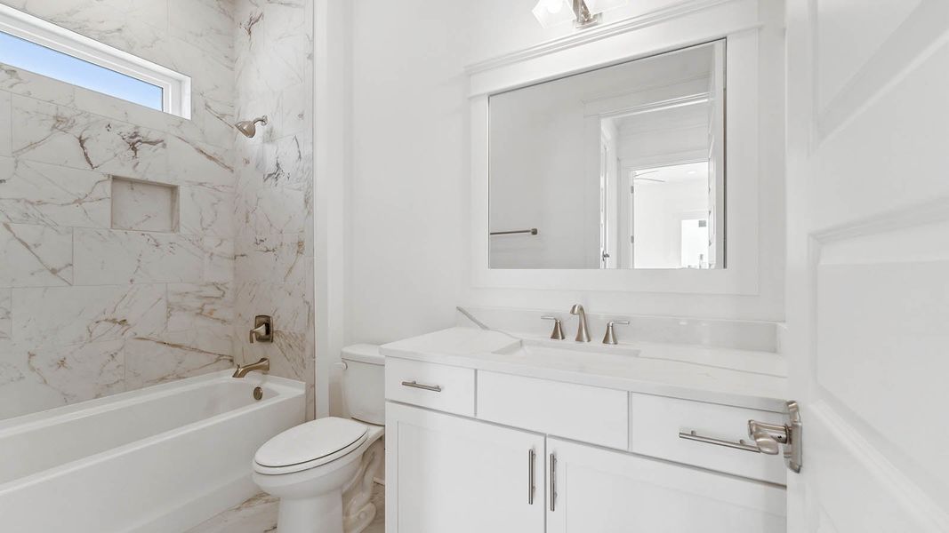 Representative furnished interior of a home built from the Cayman by D.R. Horton in Parkside, Santa Rosa Beach (Image 7).
