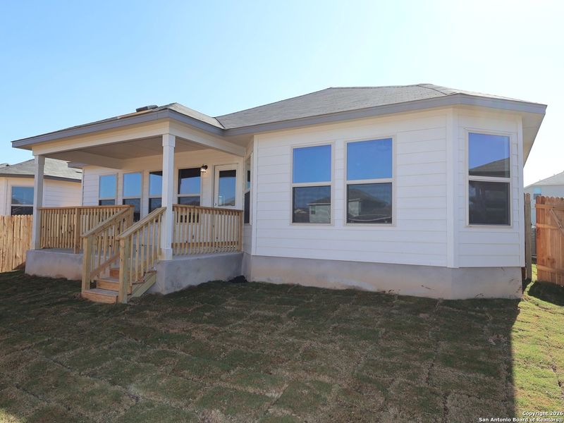 Exterior details and patio area of a home in Winding Brook, San Antonio (Image 20).