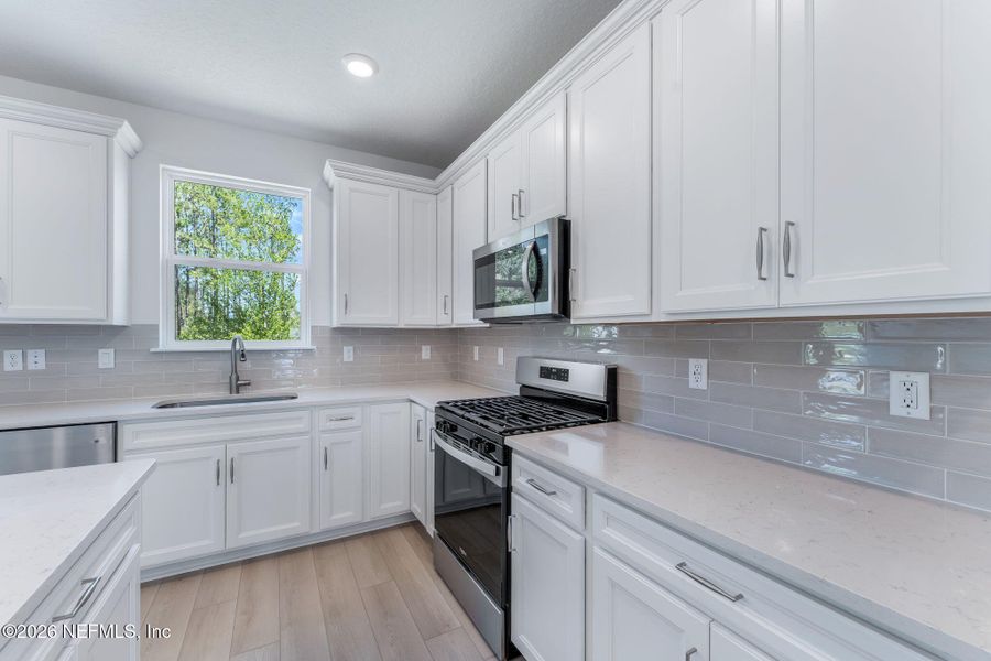 Furnished interior view inside a new home in Del Webb Wildlight, Yulee (Image 13).