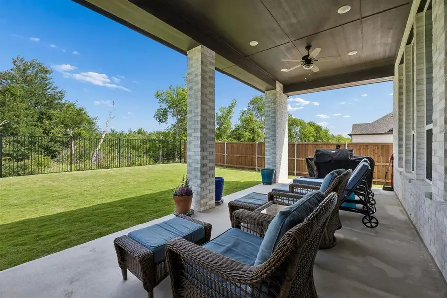 Covered patio featuring a ceiling fan and recessed lighting Covered patio featuring a ceiling fan and recessed lighting