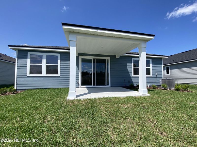 Front exterior of a new home in Lakes at Bella Lago, Green Cove Springs, FL, highlighting curb appeal (Image 15). Front exterior of a new home in Lakes at Bella Lago, Green Cove Springs, FL, highlighting curb appeal (Image 15).