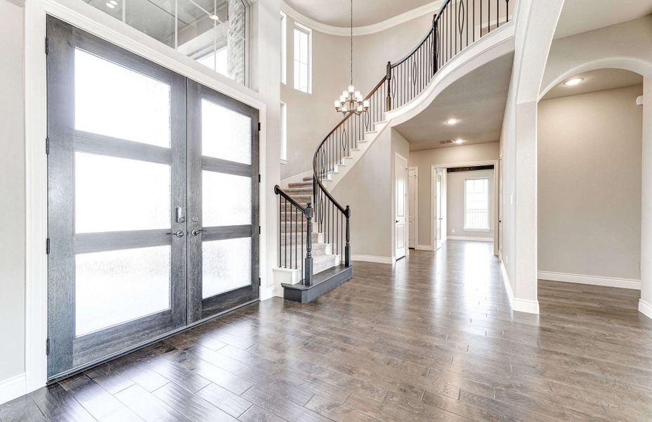 Representative unfurnished interior of a home built from the 4590 by Ravenna Homes in Artavia 70′, Conroe (Image 15).