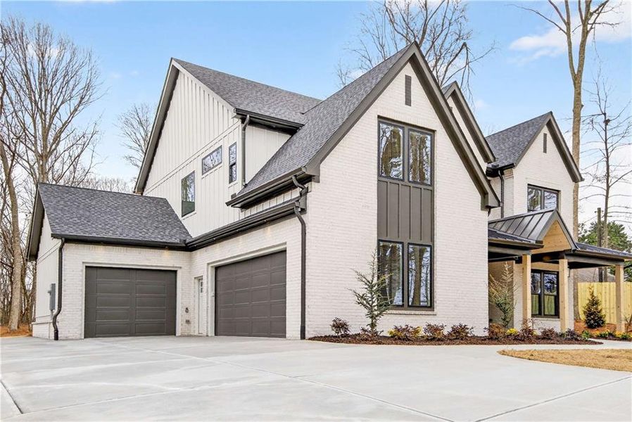 Front exterior of a new home in , Cumming, GA, highlighting curb appeal (Image 26).