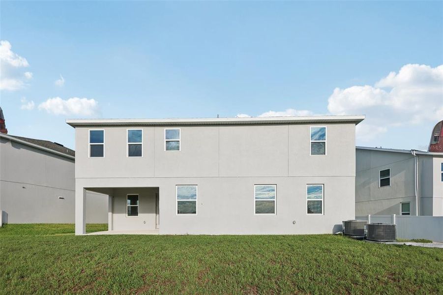 Front exterior of a new home in , Groveland, FL, highlighting curb appeal (Image 1). Front exterior of a new home in , Groveland, FL, highlighting curb appeal (Image 1).