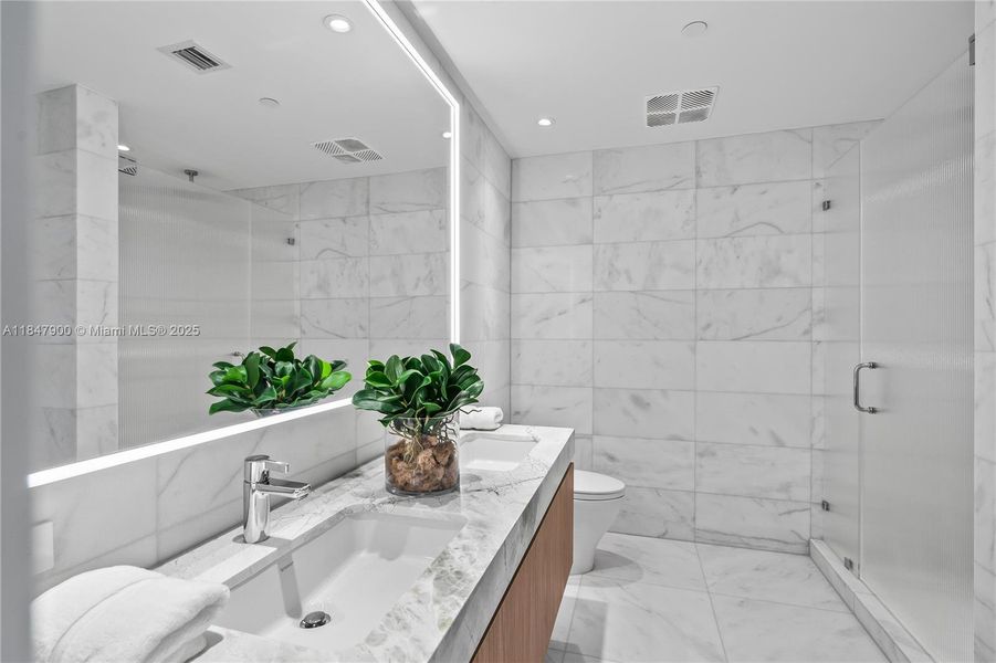 Furnished interior view inside a new home in , Miami Beach (Image 15). Furnished interior view inside a new home in , Miami Beach (Image 15).