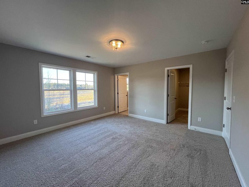 Spacious, unfurnished interior of a new home in The Cove, Sumter (Image 17).