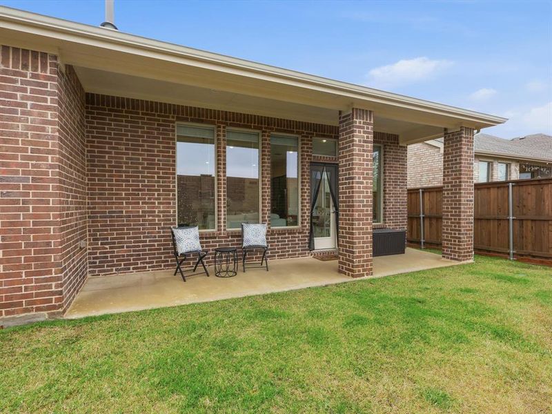 Exterior details and patio area of a home in , Little Elm (Image 3). Exterior details and patio area of a home in , Little Elm (Image 3).