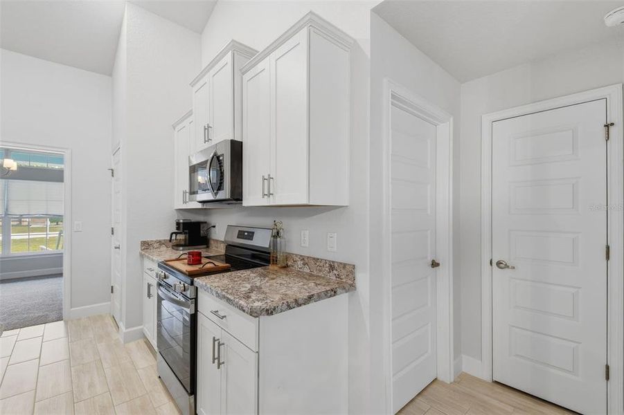Furnished interior view inside a new home in Royal Highlands, Weeki Wachee (Image 11).