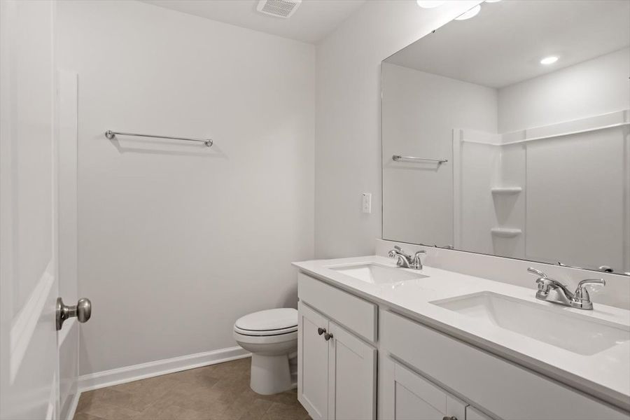 Furnished interior view inside a new home in Cambridge Reserve, Angier (Image 14).