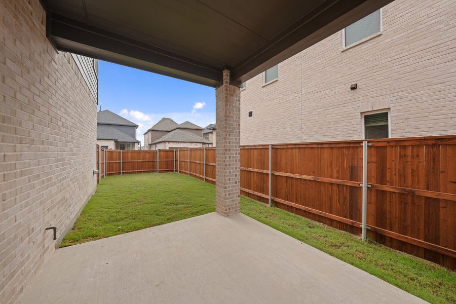Exterior details and patio area of a home in Light Farms Brenham - 40' Lots, Celina (Image 3). Exterior details and patio area of a home in Light Farms Brenham - 40' Lots, Celina (Image 3).
