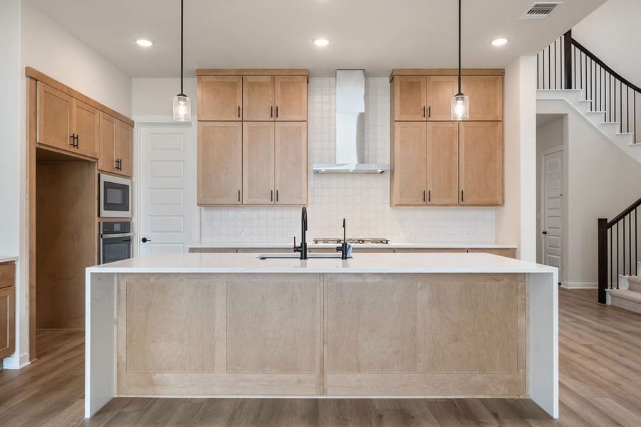 Furnished interior view inside a new home in Heritage, Dripping Springs (Image 14).