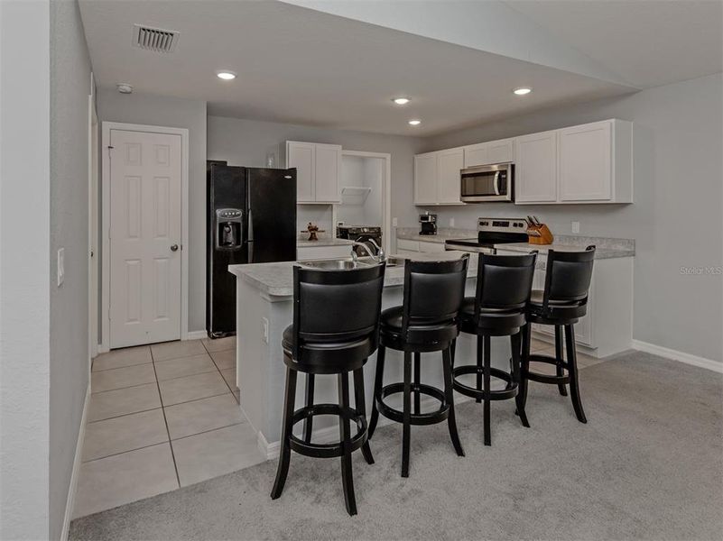 Furnished interior view inside a new home in , Port Charlotte (Image 18).