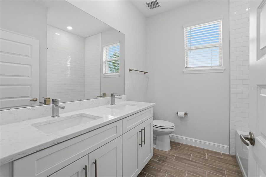 Furnished interior view inside a new home in Waterleigh, Winter Garden (Image 31).