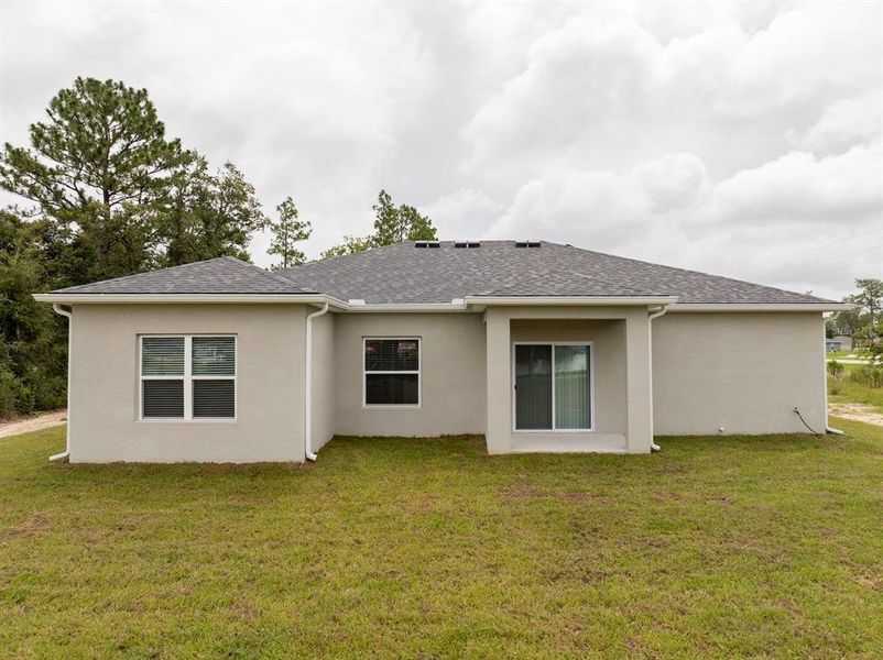 Exterior details and patio area of a home in , Ocala (Image 4).