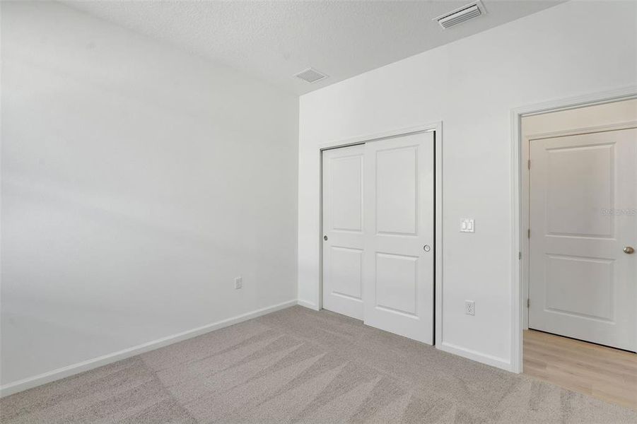 Spacious, unfurnished interior of a new home in Willowbrook North, Winter Haven (Image 26).