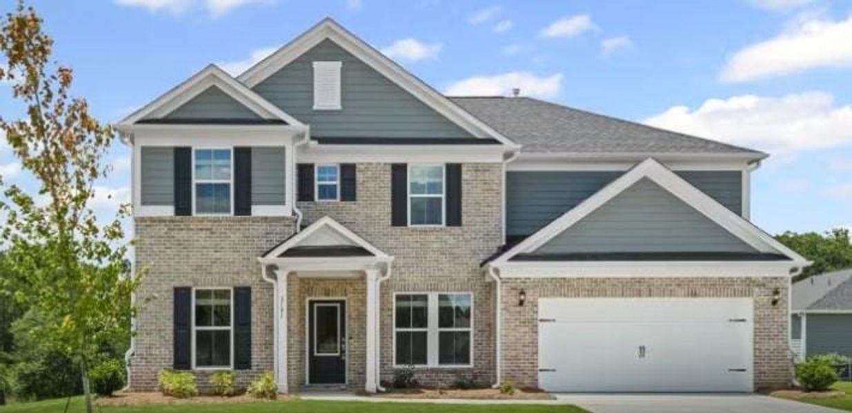 Front exterior of a new home in Haverhill Estates, Dacula, GA, highlighting curb appeal (Image 2).