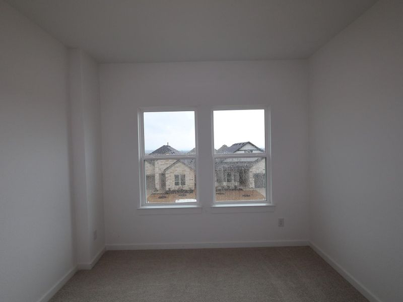 Spacious, unfurnished interior of a new home in Heritage, Dripping Springs (Image 17).