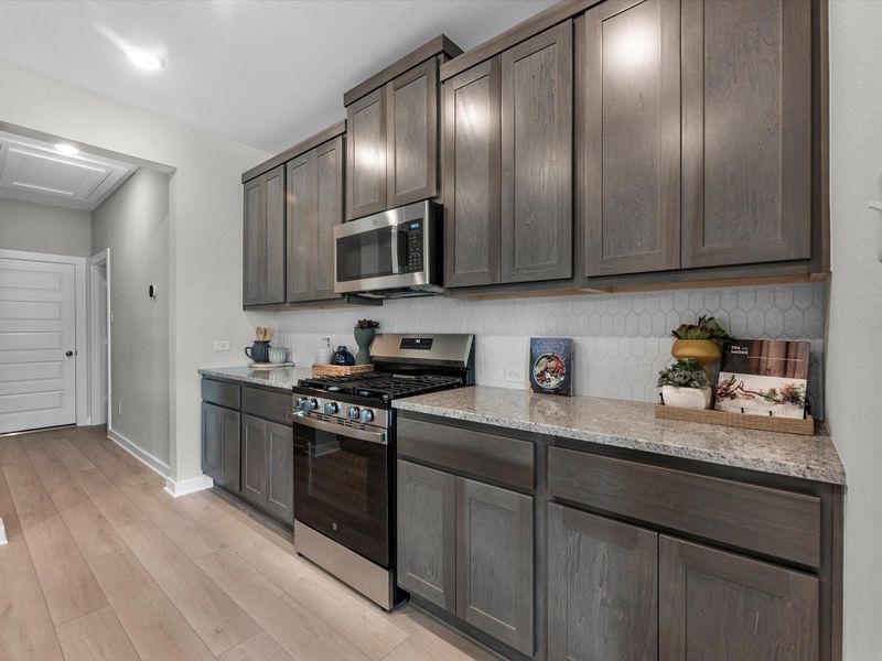Furnished interior view inside a new home in Mason Woods, Cypress (Image 15).