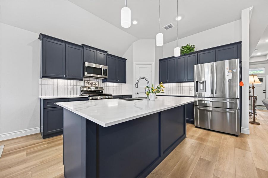 Newly renovated gourmet kitchen featuring custom soft-close cabinetry, expansive quartz countertops, and a seamless full-height backsplash. Designed for both professional-grade meal prep and sophisticated entertaining, this space offers premium durability, whisper-quiet hardware, and an easy-to-clean, modern aesthetic. Newly renovated gourmet kitchen featuring custom soft-close cabinetry, expansive quartz countertops, and a seamless full-height backsplash. Designed for both professional-grade meal prep and sophisticated entertaining, this space offers premium durability, whisper-quiet hardware, and an easy-to-clean, modern aesthetic.