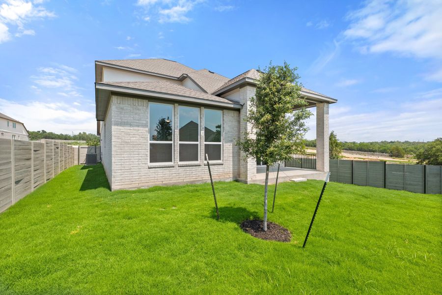 Exterior details and patio area of a home in Wolf Ranch, Georgetown (Image 32).