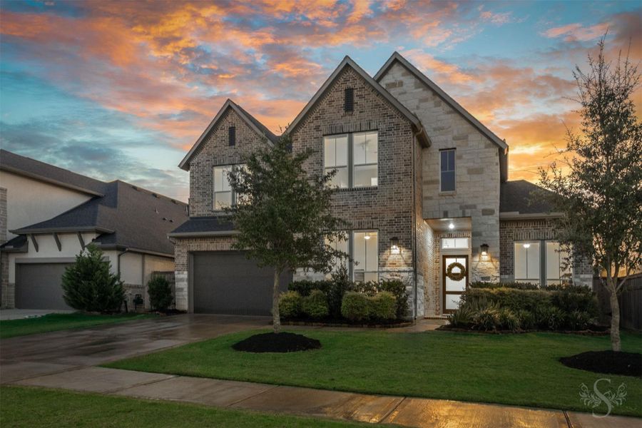 This exceptional 4 bedroom, 3.5 bath home in Cross Creek Ranch showcases striking brick and stone architecture with impressive curb appeal. A modern front door and manicured landscaping beautifully complete the exterior. This exceptional 4 bedroom, 3.5 bath home in Cross Creek Ranch showcases striking brick and stone architecture with impressive curb appeal. A modern front door and manicured landscaping beautifully complete the exterior.