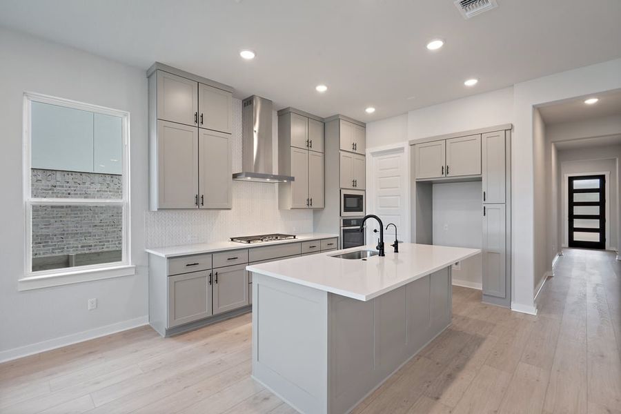 Furnished interior view inside a new home in Arbor Collection At Wolf Ranch, Georgetown (Image 8).