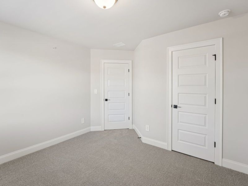 Spacious, unfurnished interior of a new home in Hemingway - Highland Series, Cumming (Image 16).