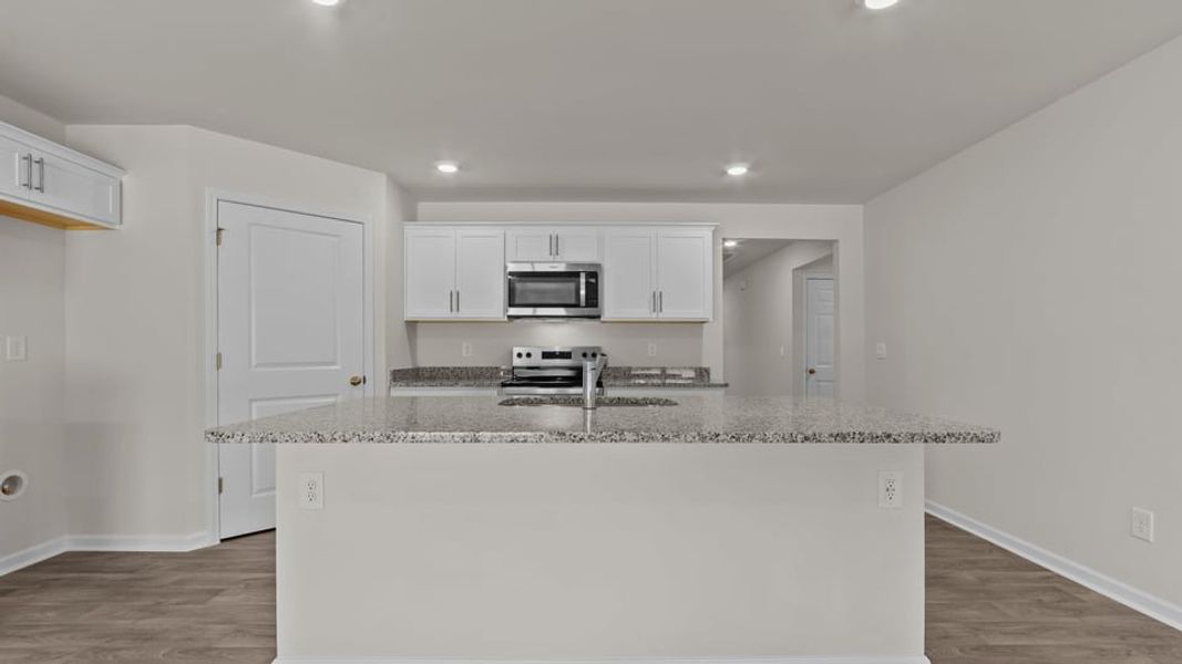 Furnished interior view inside a new home in Blair Ridge, La Grange (Image 8).