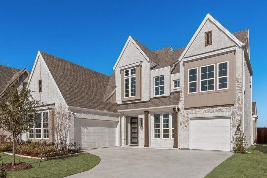 Front exterior of a new home in Grand Estates of Anna, Anna, TX, highlighting curb appeal (Image 2). Front exterior of a new home in Grand Estates of Anna, Anna, TX, highlighting curb appeal (Image 2).