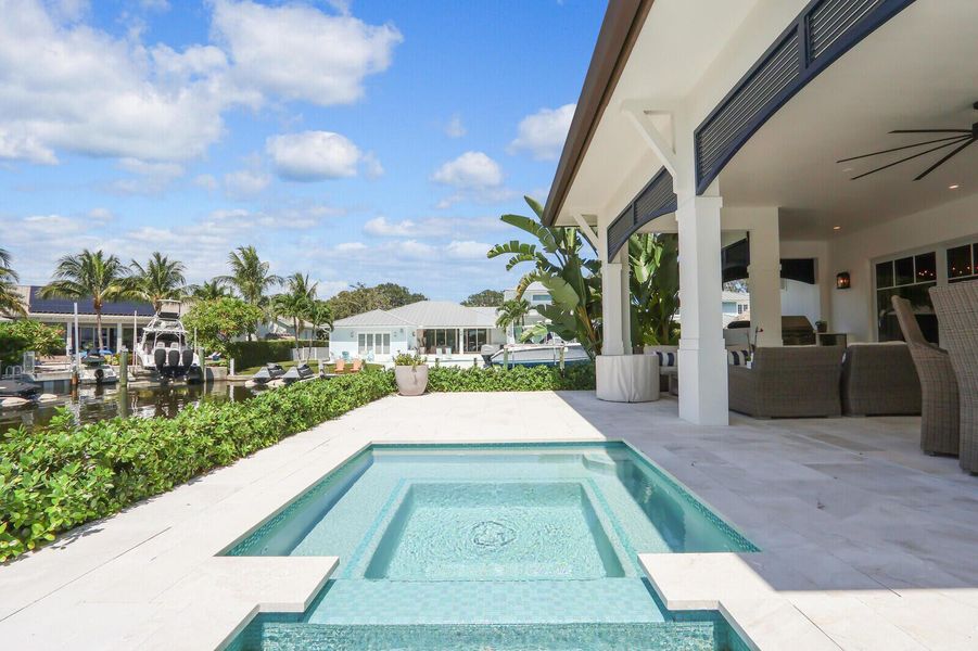 Exterior details and patio area of a home in , Jupiter (Image 1).